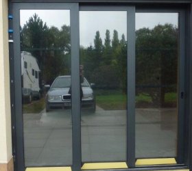 TITAN 50 XTRA mírně reflexní šedá solární fólie na externí stranu skla